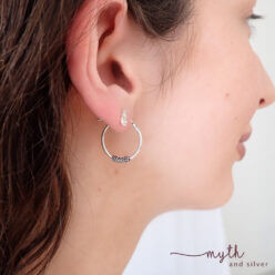 925 Sterling silver bali hoop earrings modelled by Courtney