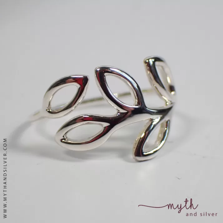 Close up of silver openwork leaf ring